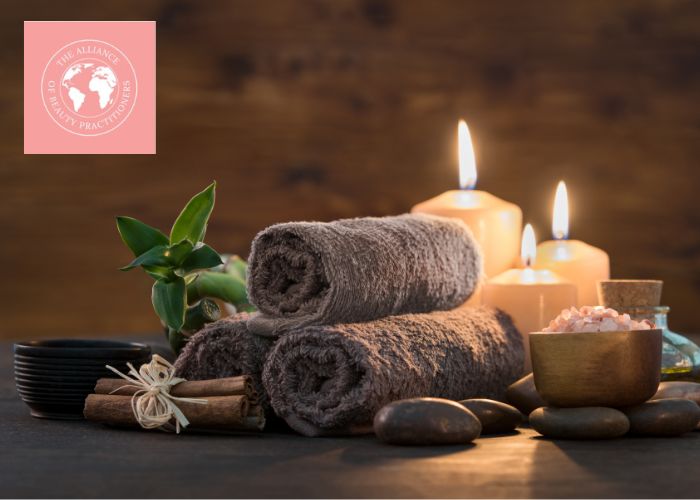 Professional Beauty Services Towels stacked with candlelight around them