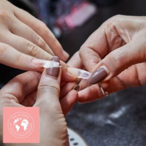 Acrylic Nail Course Manual: close up of acrylic nails being applied
