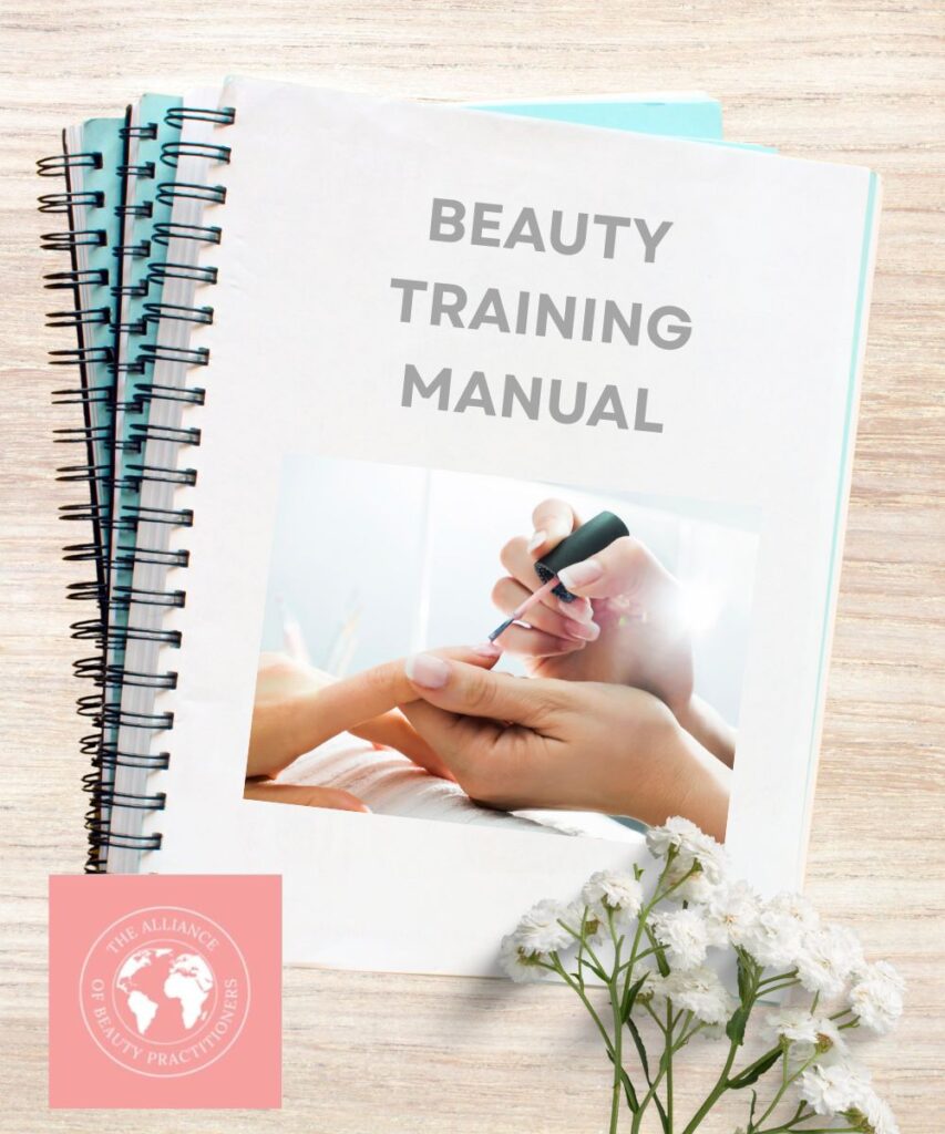 Beauty course manuals stacked with image of nail treatment on the front one and a flower in the corner