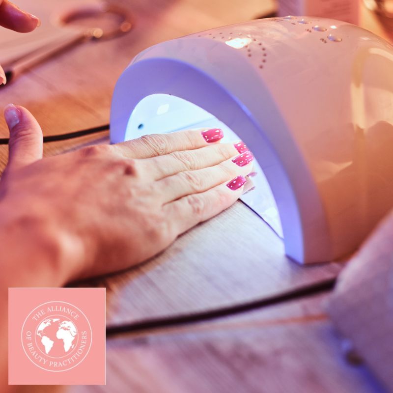 Beauty Training Manuals - Gel polish being set in lamp