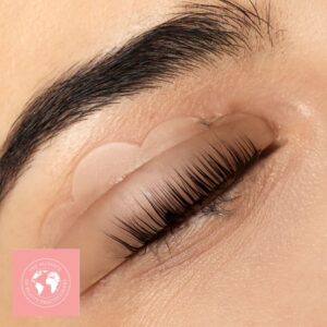 A close up of a lady's eye during an eyelash lift and tint beauty course session