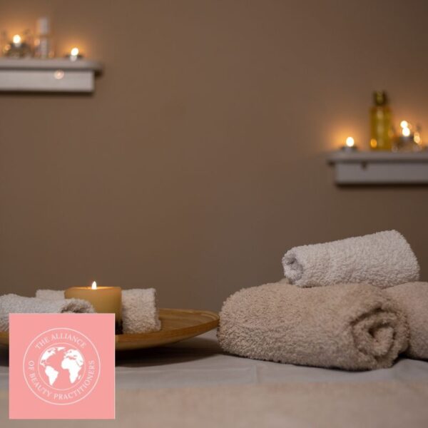 The World of Beauty Manual - a treatment room lit by candlelight