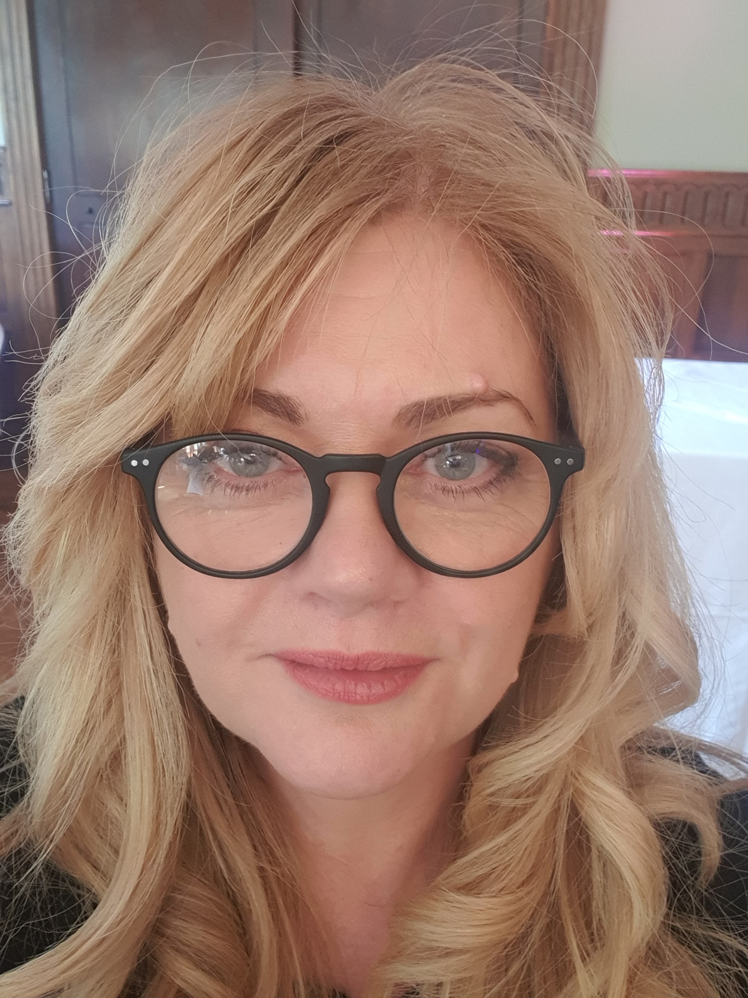 Learn about Sian Llewellyn, founder of ABP - An attractive lady with blonde hair and glasses